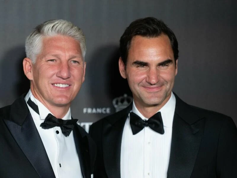 Bastian Schweinsteiger und Roger Federer