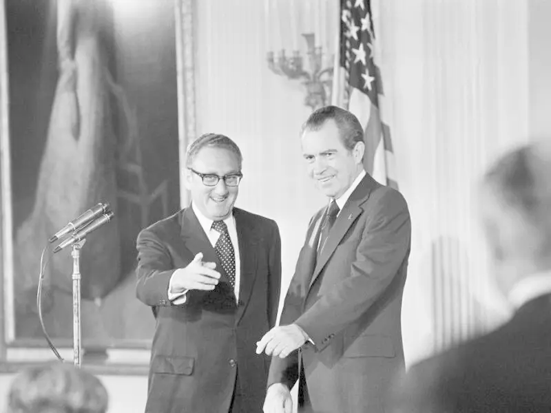 Kissinger + Nixon